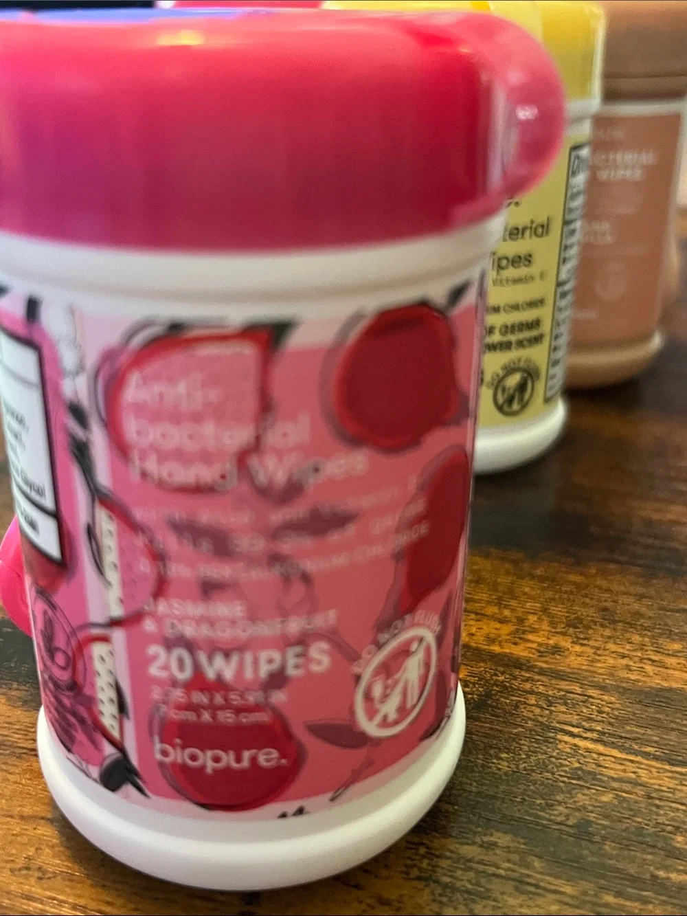 Biopure Anti-bacterial Hand Wipes in pop top plastic container with a clip